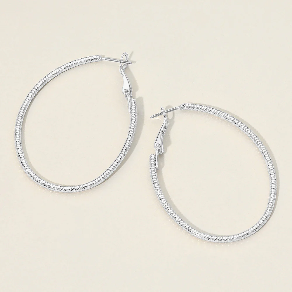 Silver Dipped Textured Oval Hoop Earrings