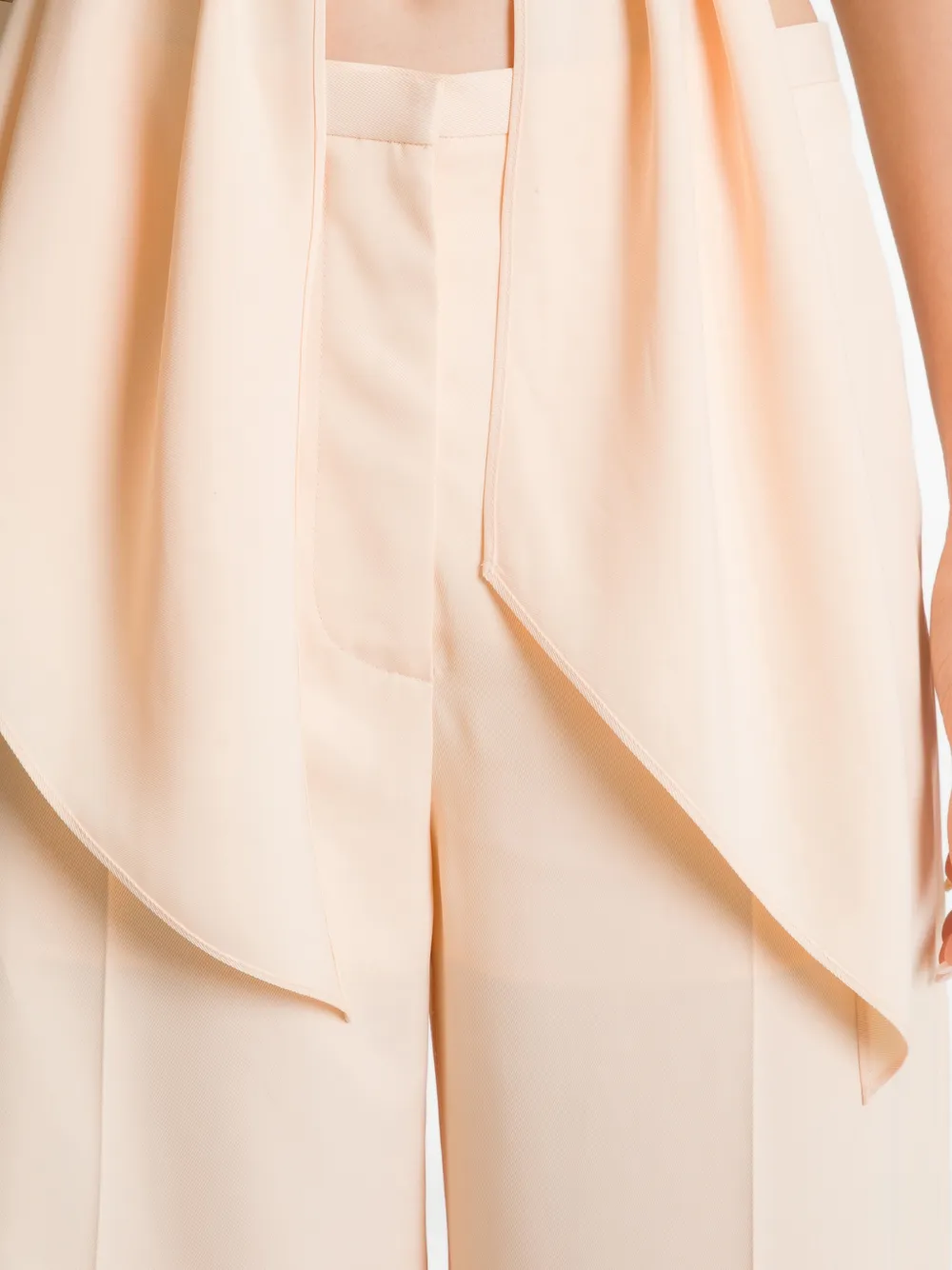 Sleeveless Halter Neck Top with Deep V-Neck and Draped Hem - Image 4