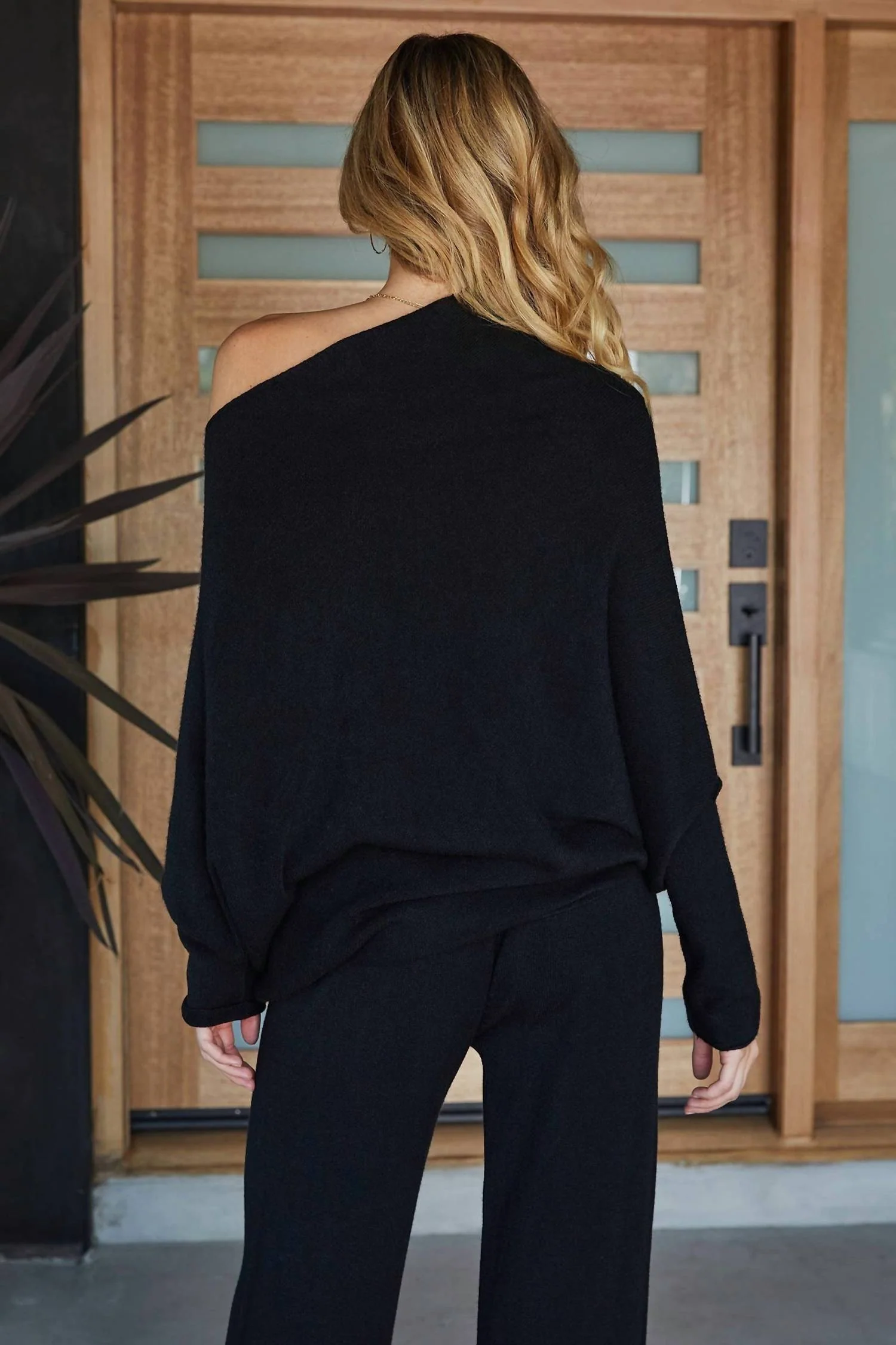 The Iconic Asymmetrical Sweater In Black - Image 4