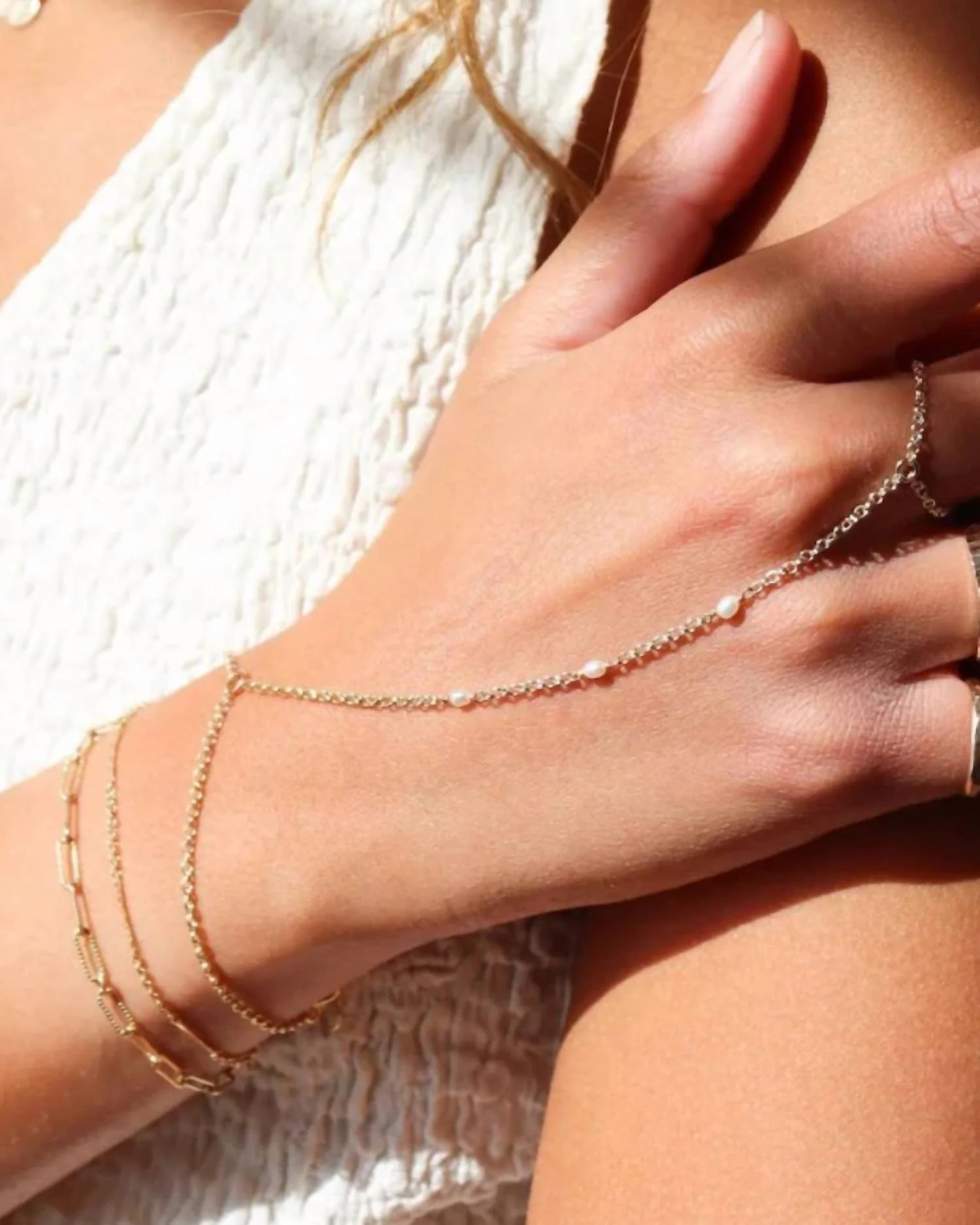 Women's Gemini Hand Chain Bracelet With Pearls In Gold - Image 2